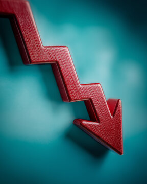 Downward Trend: A bold red arrow plunges downwards, symbolizing decline and decrease, casting a sharp contrast against a cyan backdrop. 