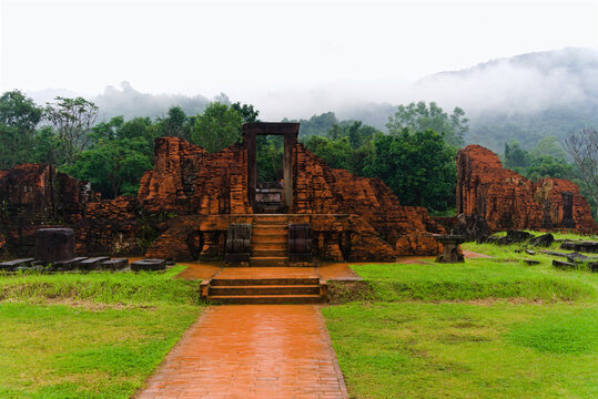 Ancient red brick tower temples of My Son Sanctuary at sunset, UNESCO World Heritage Site in Quang Nam, Vietnam.