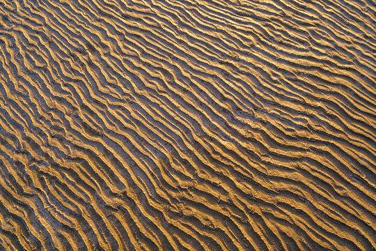 the texture of a mixture of sand, earth, clay, and snow on Lake Elton