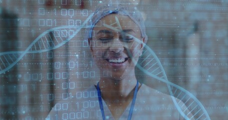 Smiling midadult clinical tech wearing scrubs, bouffant cap and lanyard in lab with DNA overlay