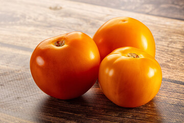 Ripe raw yellow tomato heap