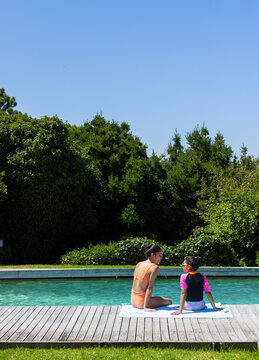 Vertical video: Book page showing problem asking to insert parentheses in 120-30:5+4*2 to reach 50