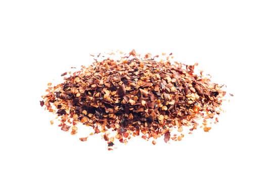Chili pepper chopped pile, isolated on white background.
