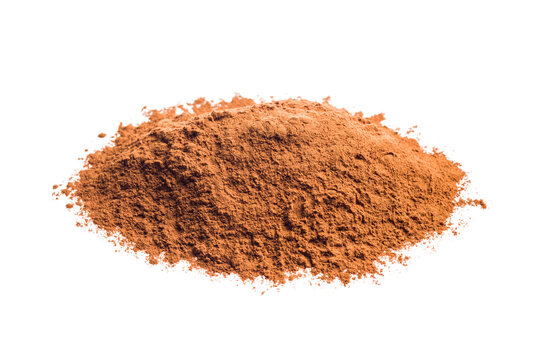 Cinnamon powder pile isolated on white background.
