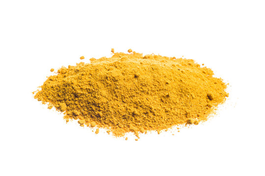 Curry powder pile isolated on white background.
