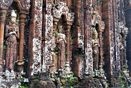 Ancient Champa sandstone carvings and brickwork at My Son Sanctuary, UNESCO World Heritage Site in Vietnam
