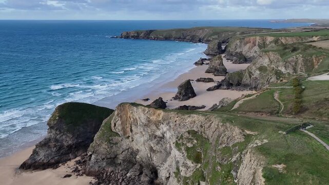 Aerial view over Bedruthan steps Cornwall from a drone 4K video