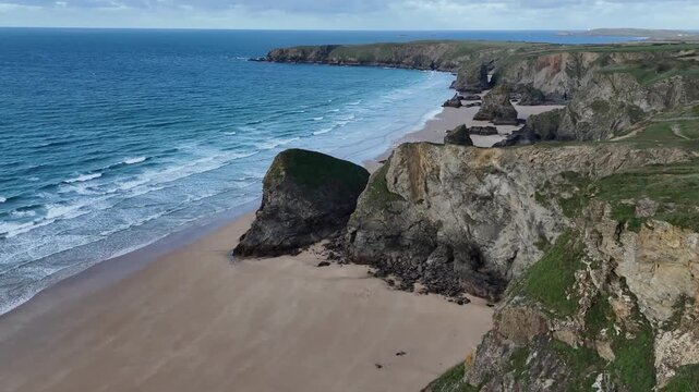 Aerial view over Bedruthan steps Cornwall from a drone 4K video