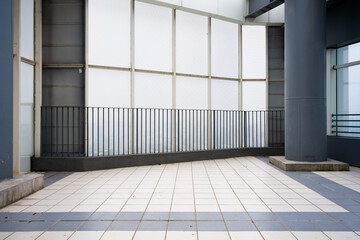 Naklejka premium Modern architectural terrace with gray columns and glass curtain wall