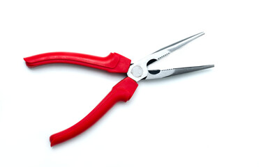 Obraz premium A close‑up of long‑nose pliers with red ergonomic handles and serrated metal jaws, isolated on a white background, showcasing a precise hand tool used for gripping, bending, and detailed repair work.