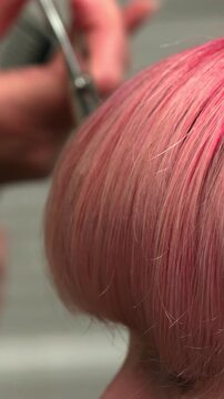Detailed View Of Hairstylist Expertly Trimming Hair With Precision Scissors In Calm Salon Environment. Media