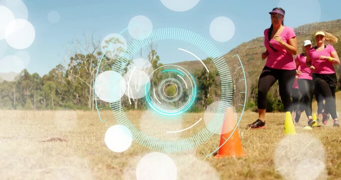 Lead female runner nearing and passing orange cone at drill start, HUD overlay tracking motion