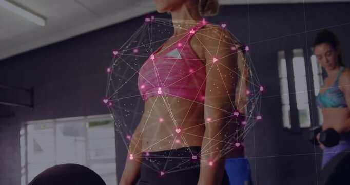 Vertical video: Gripping barbell woman in pink sportsbra lifting deadlift at gym with tech overlay