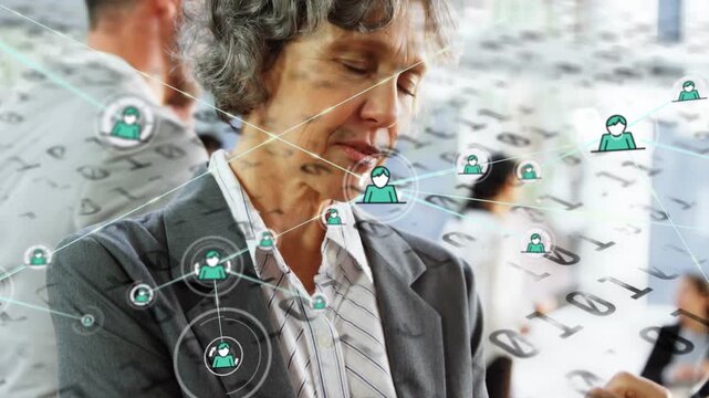 Business exec tapping tablet, sparking user icons and lines filling frame, showing network to team