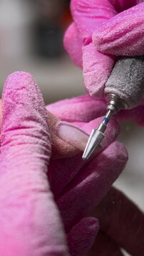 Nail Artist Refining, Expert Manicurist Carefully Sculpts Nails Using Rotary Tool For Flawless Finish. Media