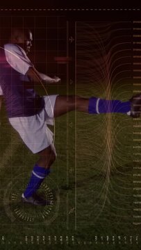 Vertical video: Adult soccer player drawing back leg, instep kick on night grass, arc aiding coach