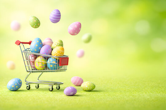 Mini shopping cart filled with colorful Easter eggs on a bright green spring background. Large copy space for Easter sale text, discounts, promo banner, retail offer or seasonal advertising.