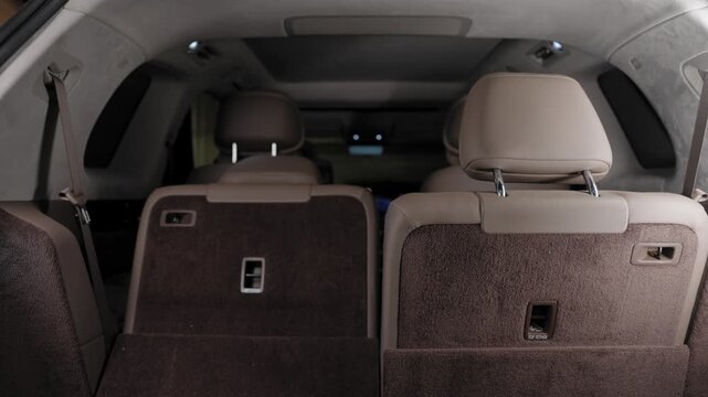 The rear seat of the car folds down. 