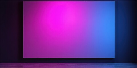 Fototapeta premium Blank screen glows with vibrant pink, blue hues. Dark room creates dramatic visual effect. Minimalist presentation focuses on color gradient.