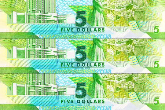 5 Dollars Trinidad and Tobago polymer bankno teeatures the Eric Williams Financial Complex in Port of Spain. Trinidad and Tobago plastic money.