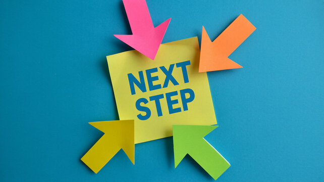 Colorful sticky note with next step message and arrows