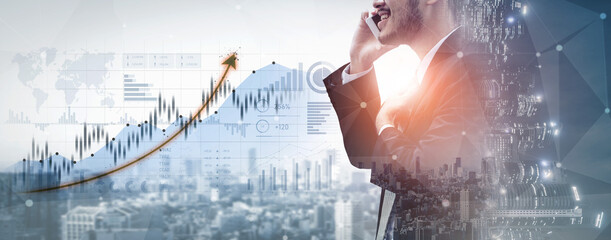 A businessman engaged in a phone conversation stands in front of a modern city skyline, surrounded by financial graphs that symbolize growth and innovation. Scalp © InfiniteFlow