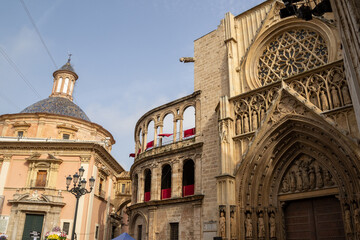 Valencia Cathedral and Royal Basilica of Our Lady of the Forsaken (Real Bas&iacute;lica de Nuestra Se&ntilde;ora de los Desamparados) from Plaza de la Virgen, Valencia, Spain. 