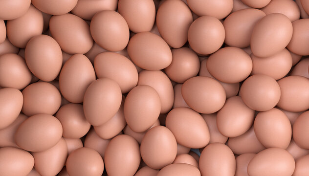 Close up background texture of many natural brown chicken eggs forming an organic pattern food concept with natural colors and soft lighting.  