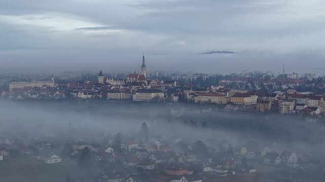 TABOR historical town aerial panorama with morning fog rising above historic city and surrounding landscape.