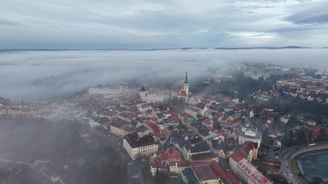 TABOR historical town aerial panorama with morning fog rising above historic city and surrounding landscape.