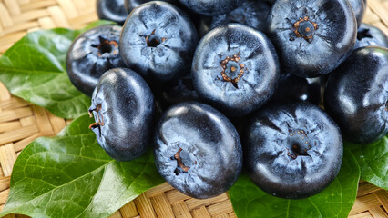 Fresh blueberries healthy food in wooden bowl © Chaaim