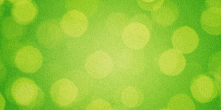 Abstract green background with blurred circular bokeh lights creating a soft texture