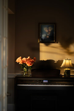 Upright piano with roses 