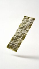 A single sheet of dried seaweed, nori, isolated on a white background, ready for use
