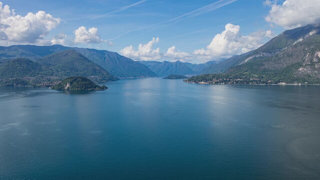 Time lapse, panoramic view on a lake where Lake Como&rsquo;s three branches meet. Lake Como, Lombardy, Italy.