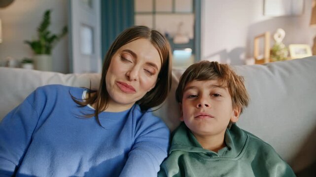 Pov mother son videocalling home waving tablet webcam closeup. Happy mom boy