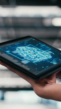 Vertical video Optimizing AI performance, devices and team of technicians in data center using deep learning. Brainstorming, neural network automation and software developers in data center, camera B