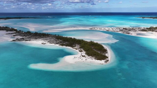 Aerial view of Man-O-War Cay in Moriah Harbour Cay National Park showing the island and sandbars in the Exumas, Bahamas.