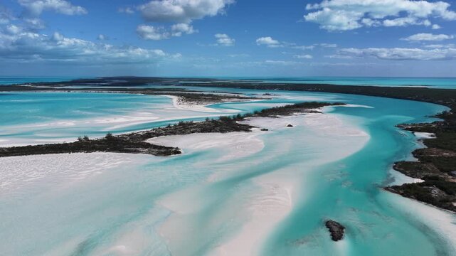 Aerial view of Man-O-War Cay in Moriah Harbour Cay National Park showing the island and sandbars in the Exumas, Bahamas.