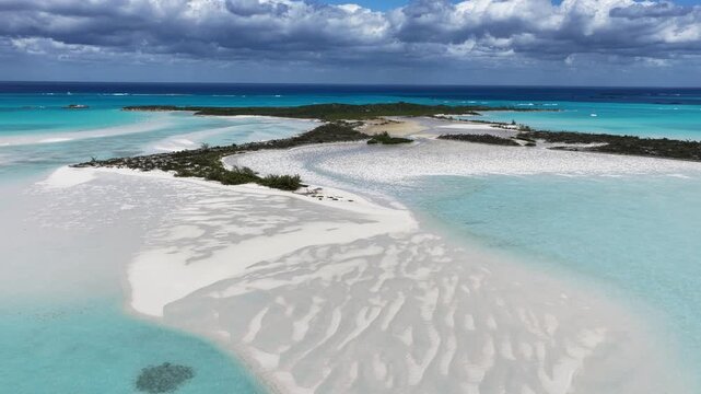 Aerial view of Man-O-War Cay in Moriah Harbour Cay National Park showing the island and sandbars in the Exumas, Bahamas.