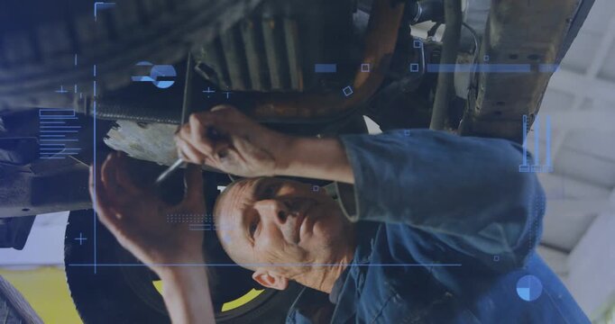 Mechanic lying under car lifting wrench and activating auto overlay marking badge number for ID