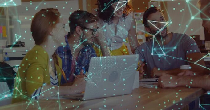 5 colleagues leaning into laptop standing woman pointing newcomer entering data overlay hovering