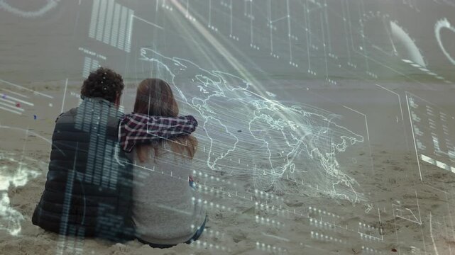 Couple sitting monitoring kids entering right on beach, running with kite, tech HUD overlaying map