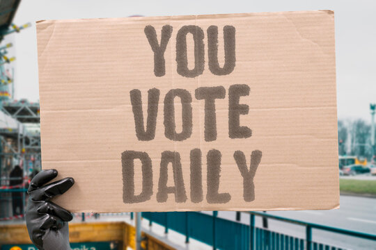 "You Vote Daily" Every product you buy is a vote for the kind of economy you want. ECONOMY. CONSUMER. VOTE. WALLETS. SPENDING.