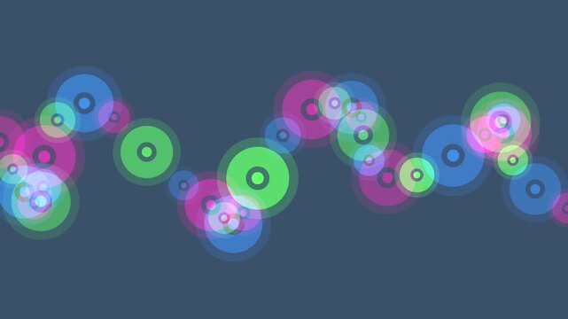 Continuous parade of semi-transparent, colorful concentric circles moving in a synchronized wave-like chain across a blue background.