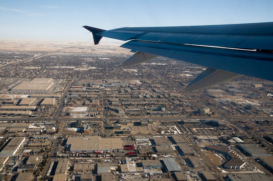 Canada, Alberta, Calgary.  Aerial view of the city from comercial airliner during takeoff.