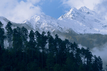 Fototapeta premium Majestic Snow-Capped Mountain and Alpine Forest Landscape Photography in Autumn and Winter, Sichuan-Xizang China