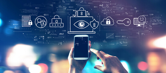 Data Privacy concept with a smartphone in city lights at night