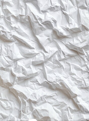 Fototapeta premium Close-up view of crumpled white paper texture with shadows creating depth