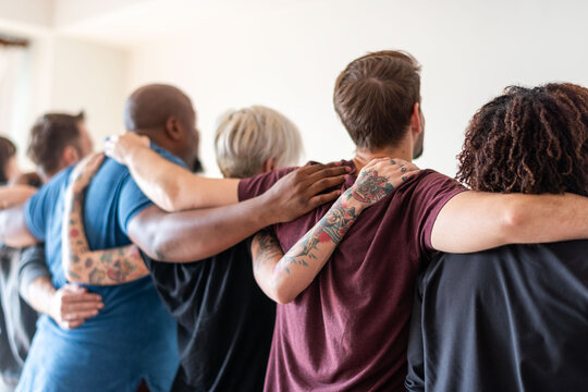 Diverse group unity embrace
